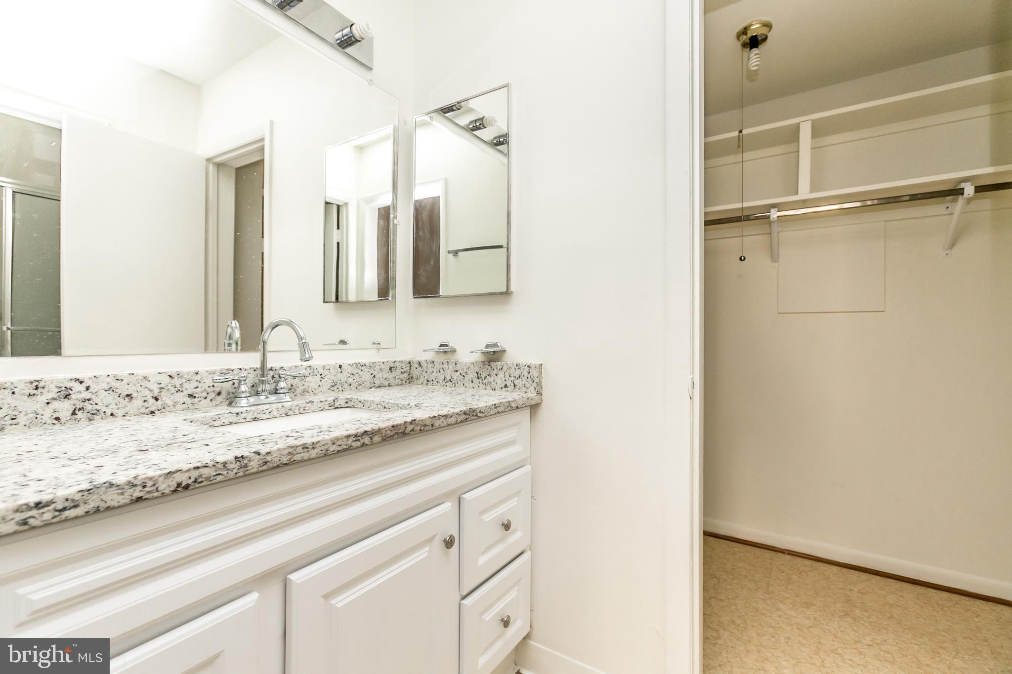 7 Hamill Road, Unit 7C Baltimore, MD 21210 - Photo 17 of 23 Primary en suite & walk-in closet