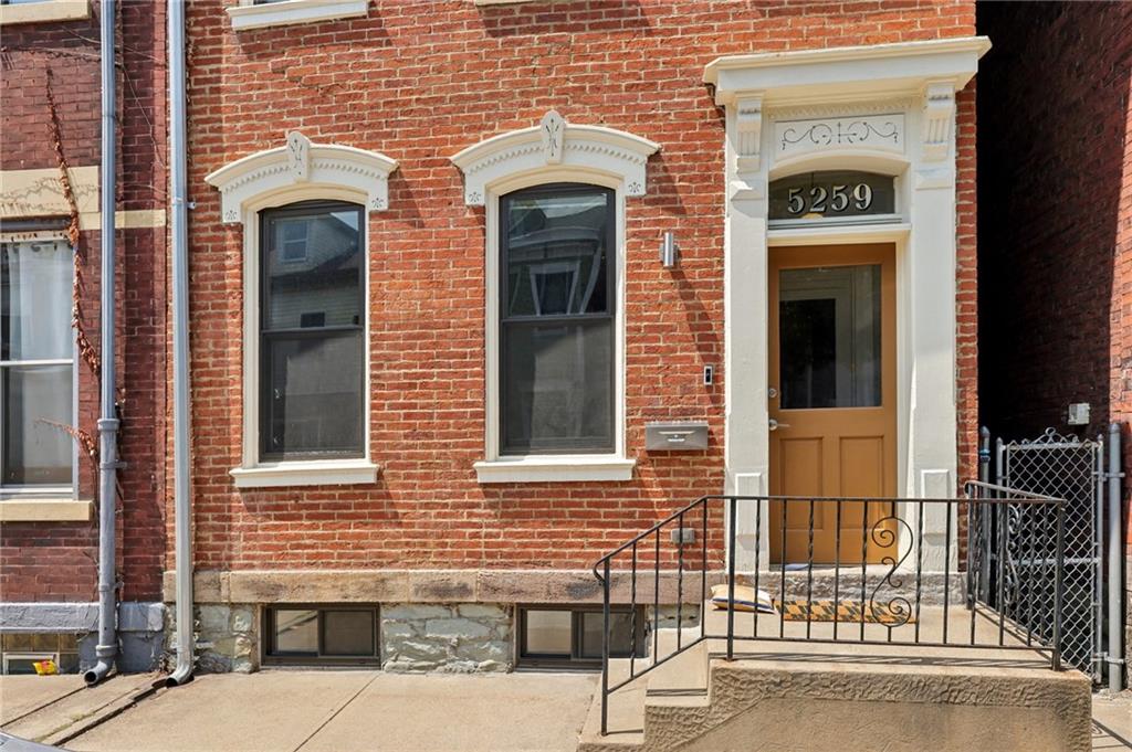 5259 Carnegie Street Lawrenceville, PA 15201 - Photo 2 of 50 a view of front door of a house with a door