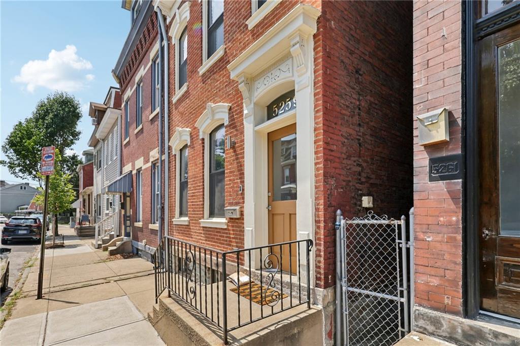 5259 Carnegie Street Lawrenceville, PA 15201 - Photo 3 of 50 a view of a brick building with many windows