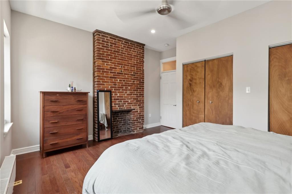 5259 Carnegie Street Lawrenceville, PA 15201 - Photo 34 of 50 a bedroom with a bed and a dresser
