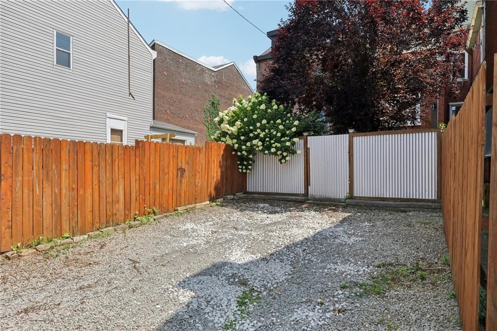 5259 Carnegie Street Lawrenceville, PA 15201 - Photo 49 of 50 a backyard of a house