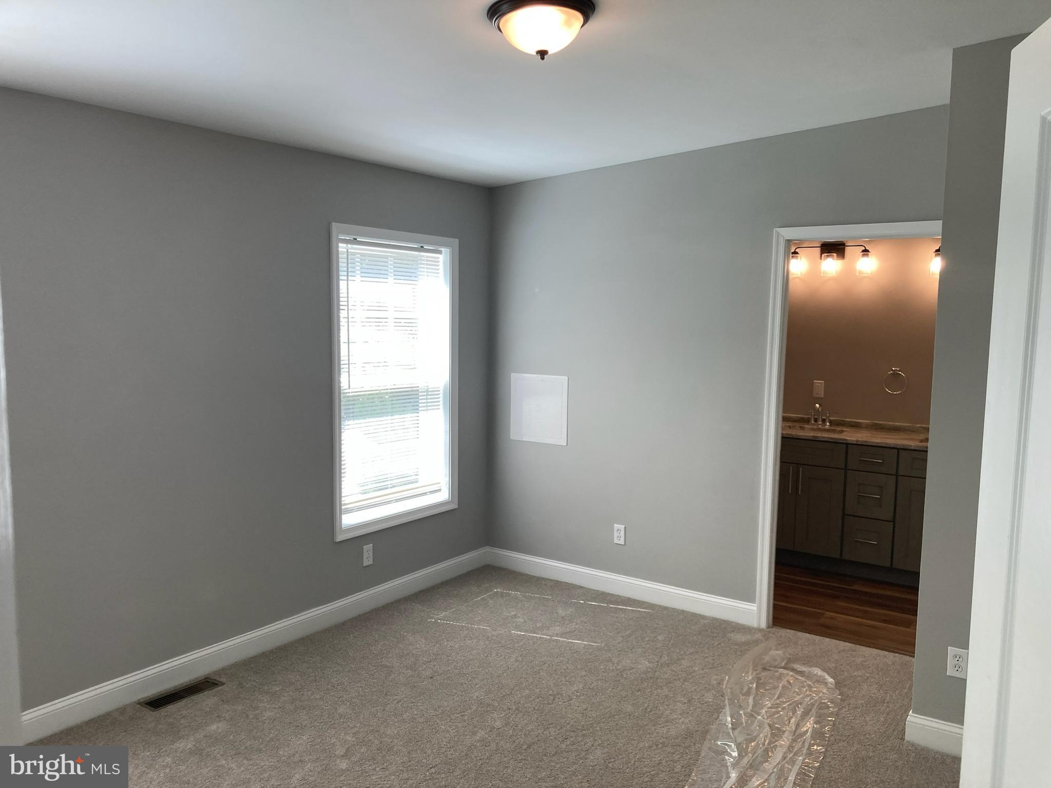 9 King Drive Bridgeton, NJ 08302 - Photo 11 of 16 a view of an empty room with window and closet area
