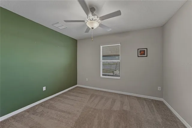 a view of a workspace with furniture