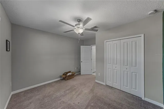 a living room with baby crib furniture and a baby crib