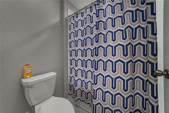 a view of a swimming pool with a yard