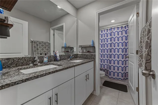 a view of a swimming pool with outdoor seating