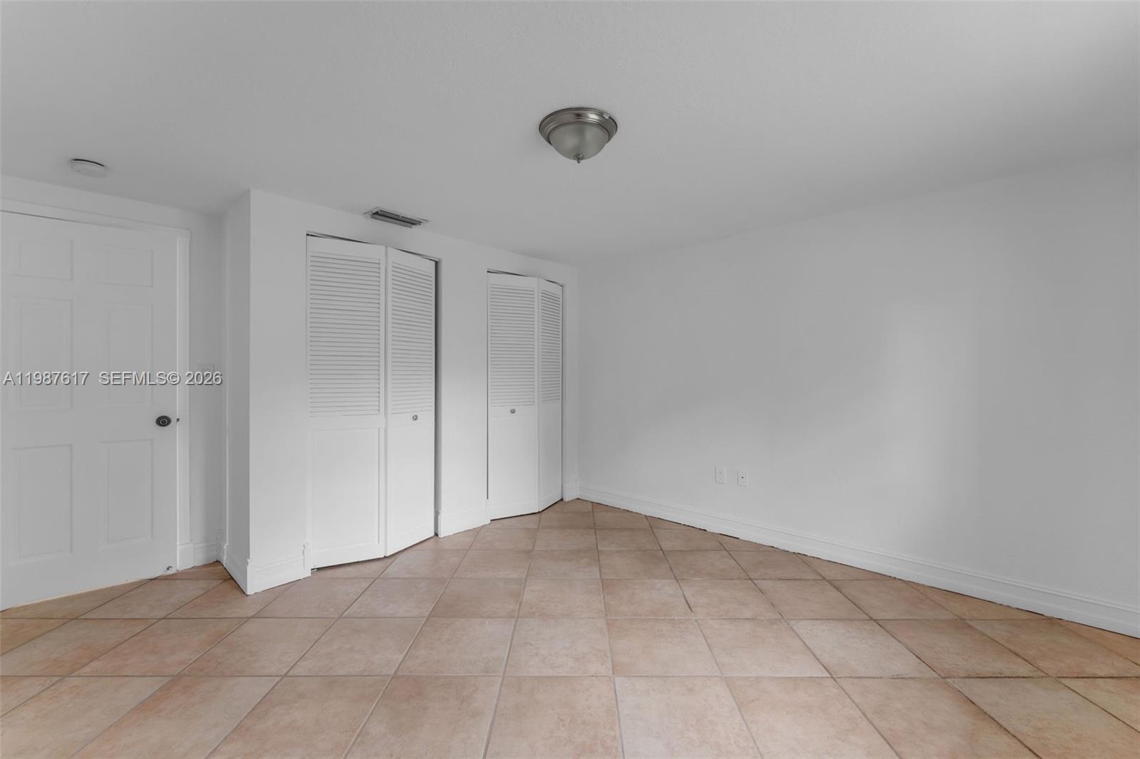 9840 Southwest 60th Street Miami, FL 33173 - Photo 22 of 37 a view of an empty room