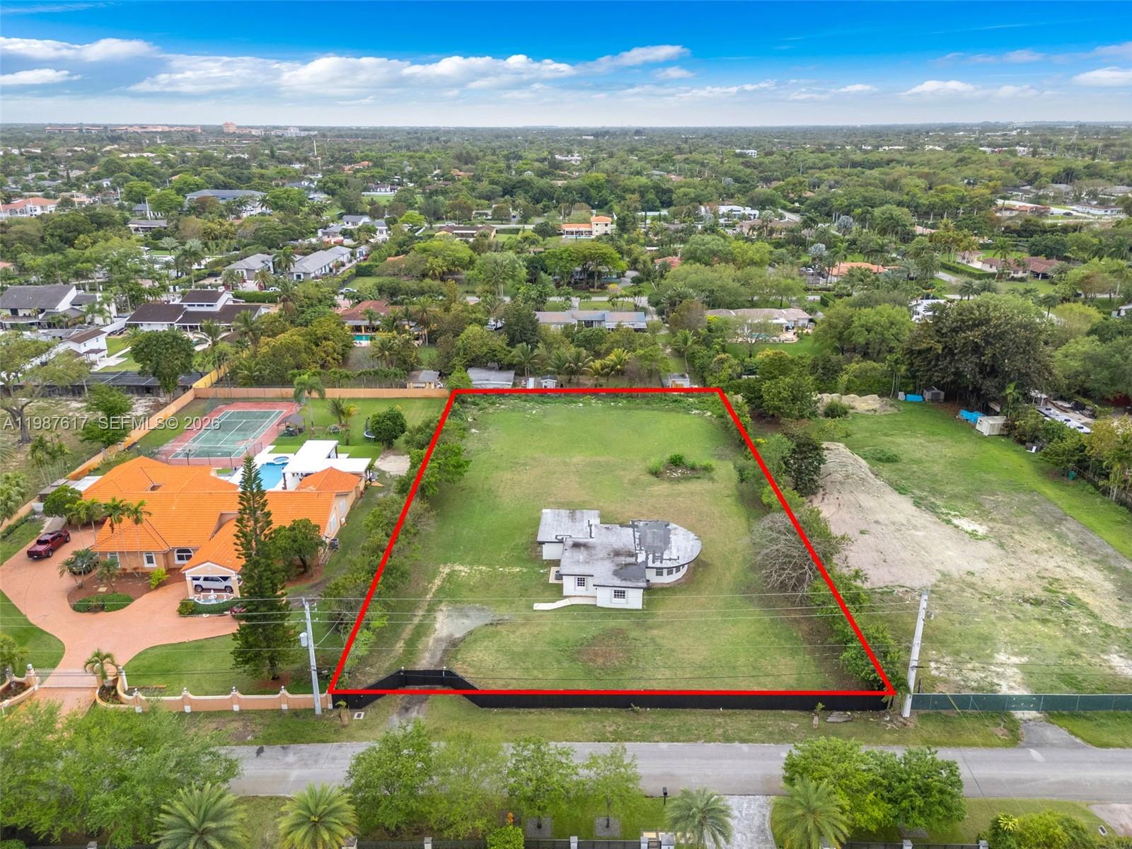 9840 Southwest 60th Street Miami, FL 33173 - Photo 28 of 37 an aerial view of a residential houses