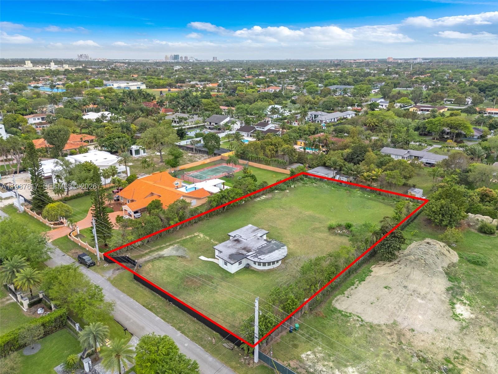 9840 Southwest 60th Street Miami, FL 33173 - Photo 30 of 37 an aerial view of residential houses with outdoor space