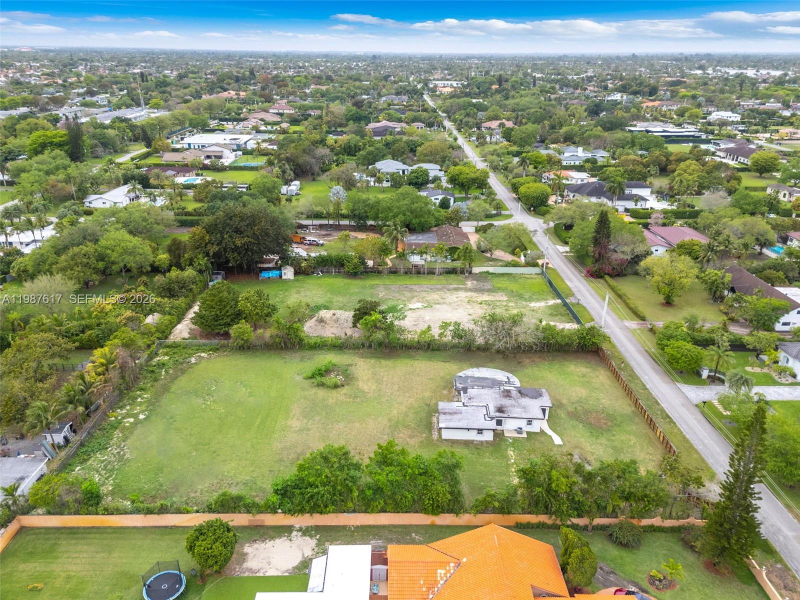 9840 Southwest 60th Street Miami, FL 33173 - Photo 37 of 37 an aerial view of residential houses with outdoor space