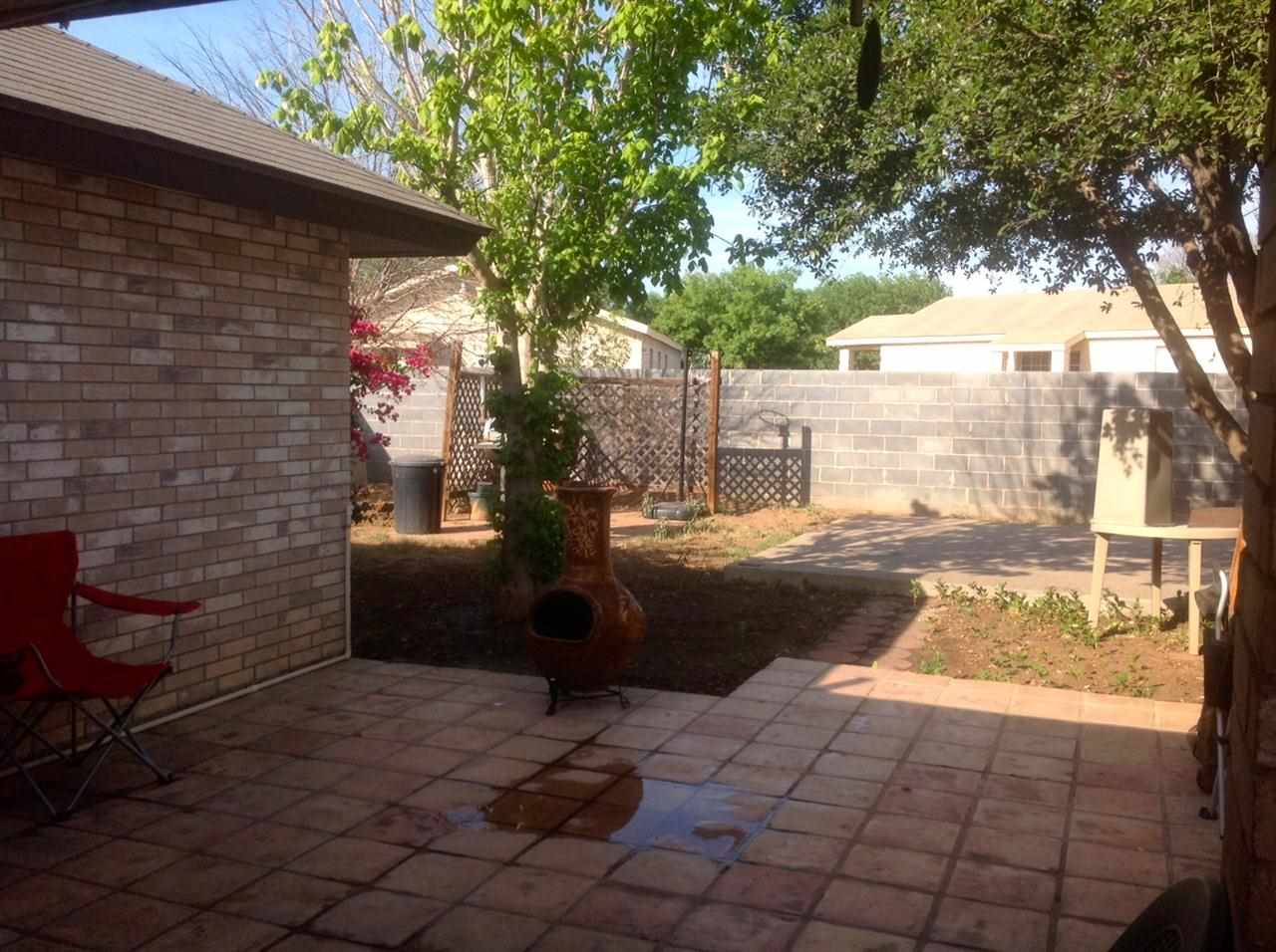 10203 Center Road Laredo, TX 78045 - Photo 4 of 9 a view of a back yard of the house