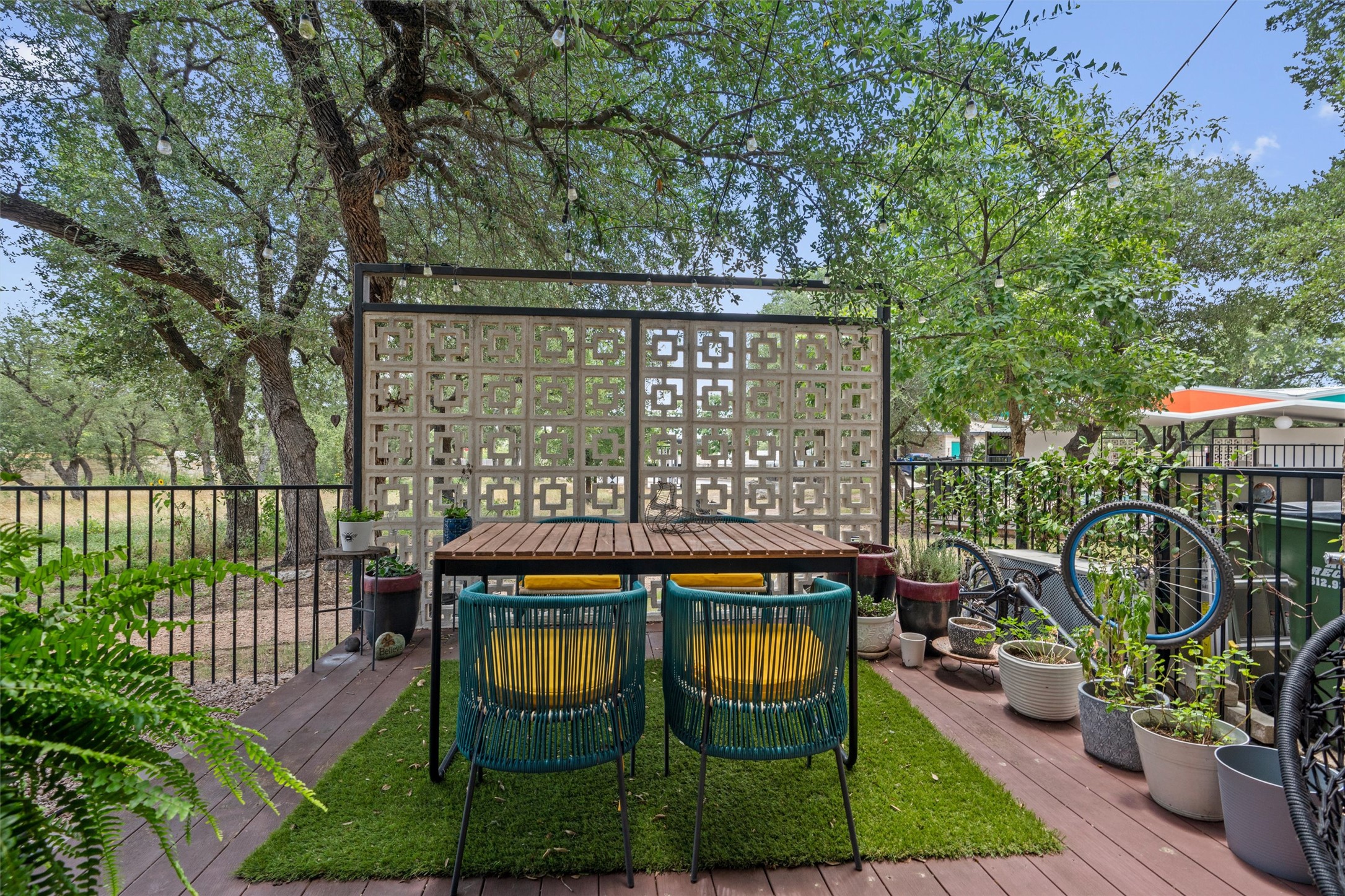 408 Starlight Village Loop Leander, TX 78641 - Photo 38 of 40 An inviting wood deck creates an outdoor oasis, perfect for relaxed gatherings amid natural surroundings.