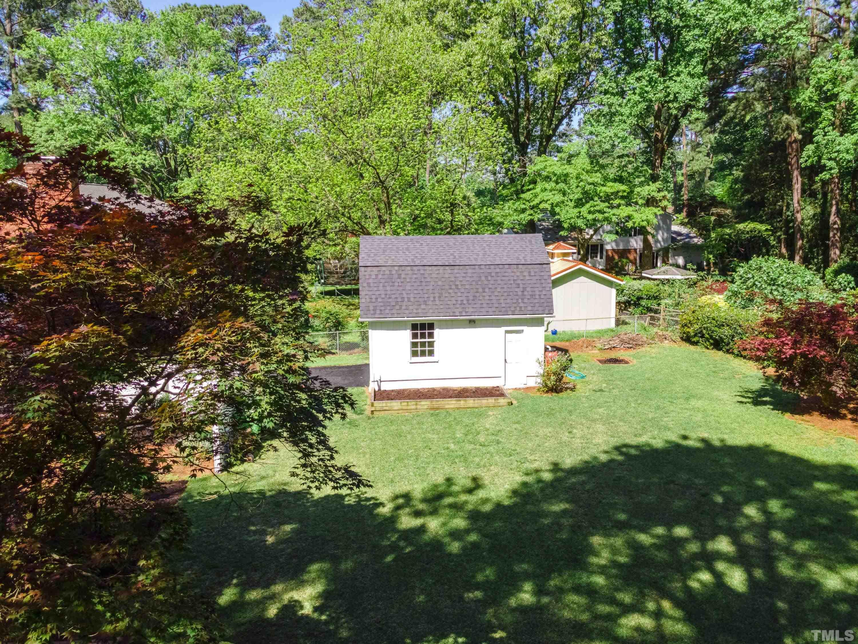 1109 Country Ridge Drive Raleigh, NC 27609 - Photo 63 of 64 a view of a house with a yard