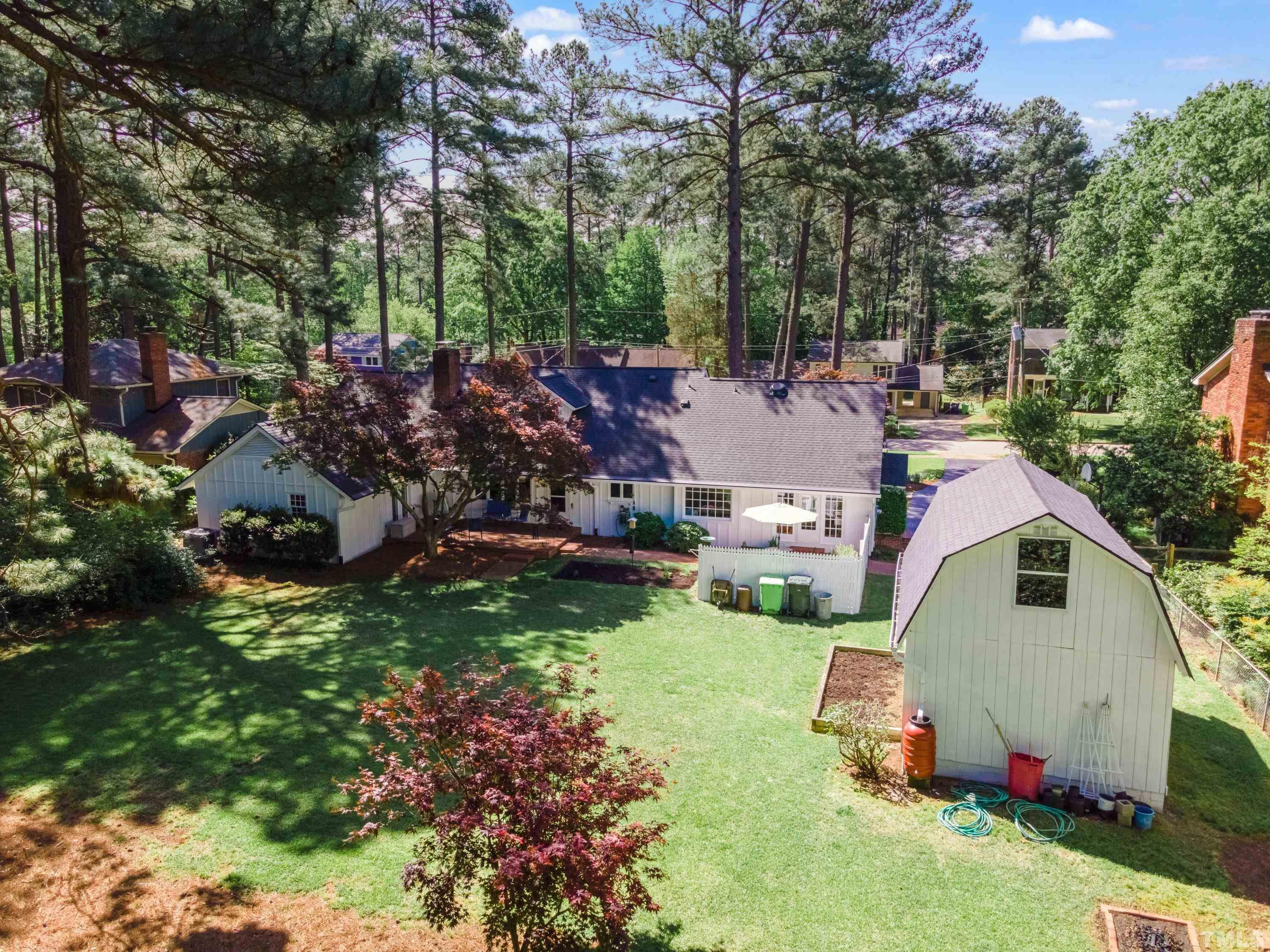 1109 Country Ridge Drive Raleigh, NC 27609 - Photo 64 of 64 a view of a house with a yard
