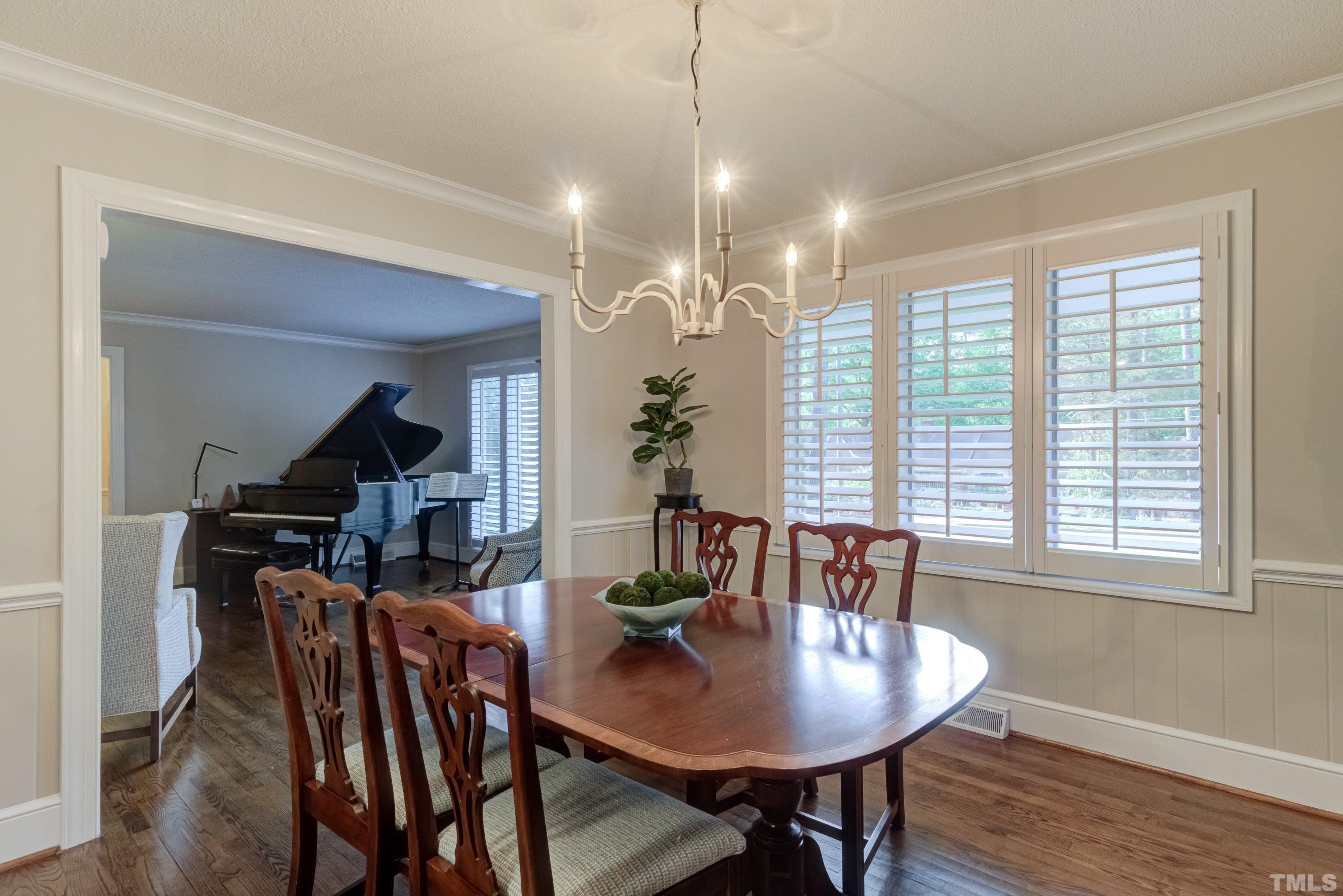 1109 Country Ridge Drive Raleigh, NC 27609 - Photo 10 of 64 a dining room with furniture and window