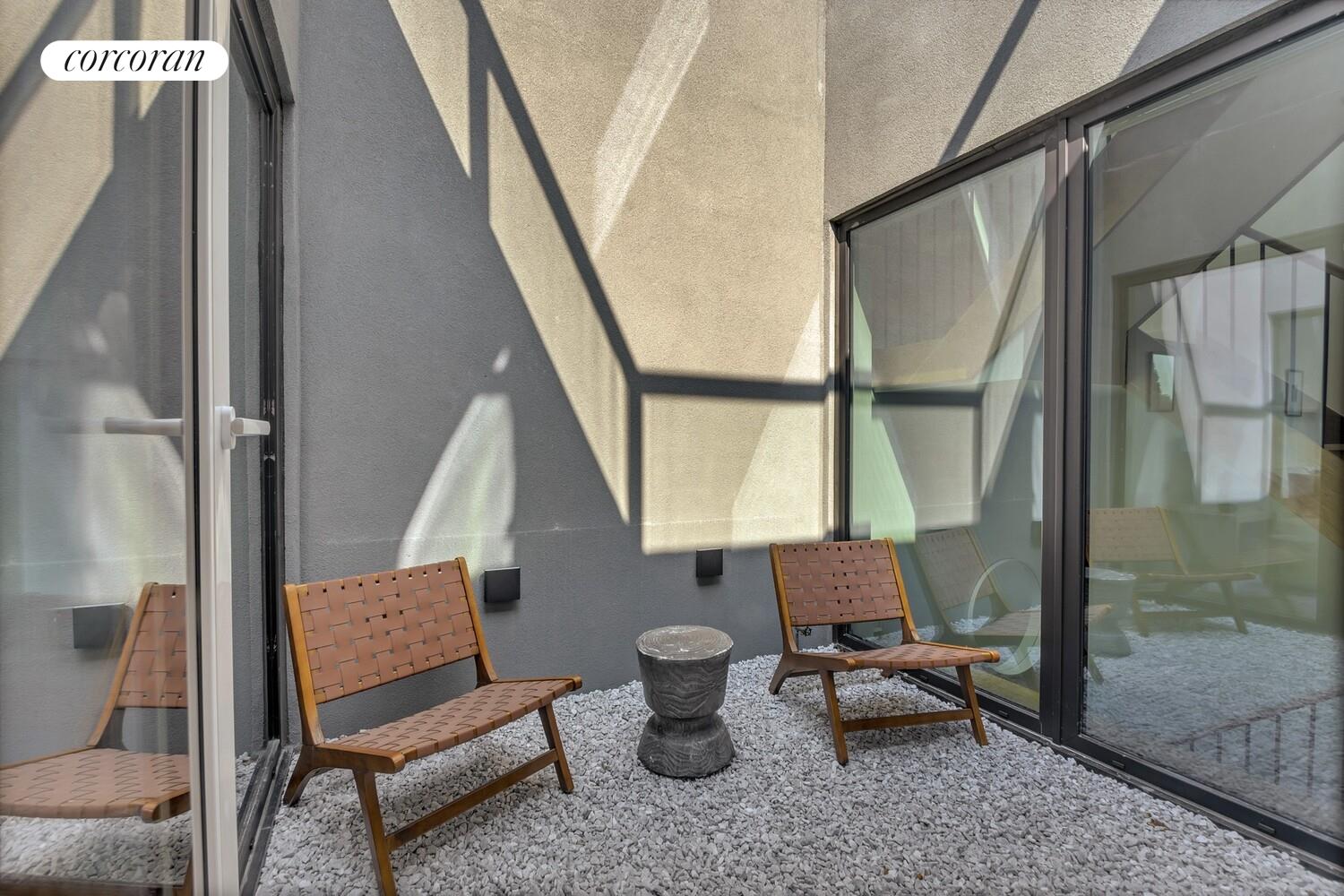 57 Summit Street Brooklyn, NY 11231 - Photo 12 of 22 a living room with furniture and a window
