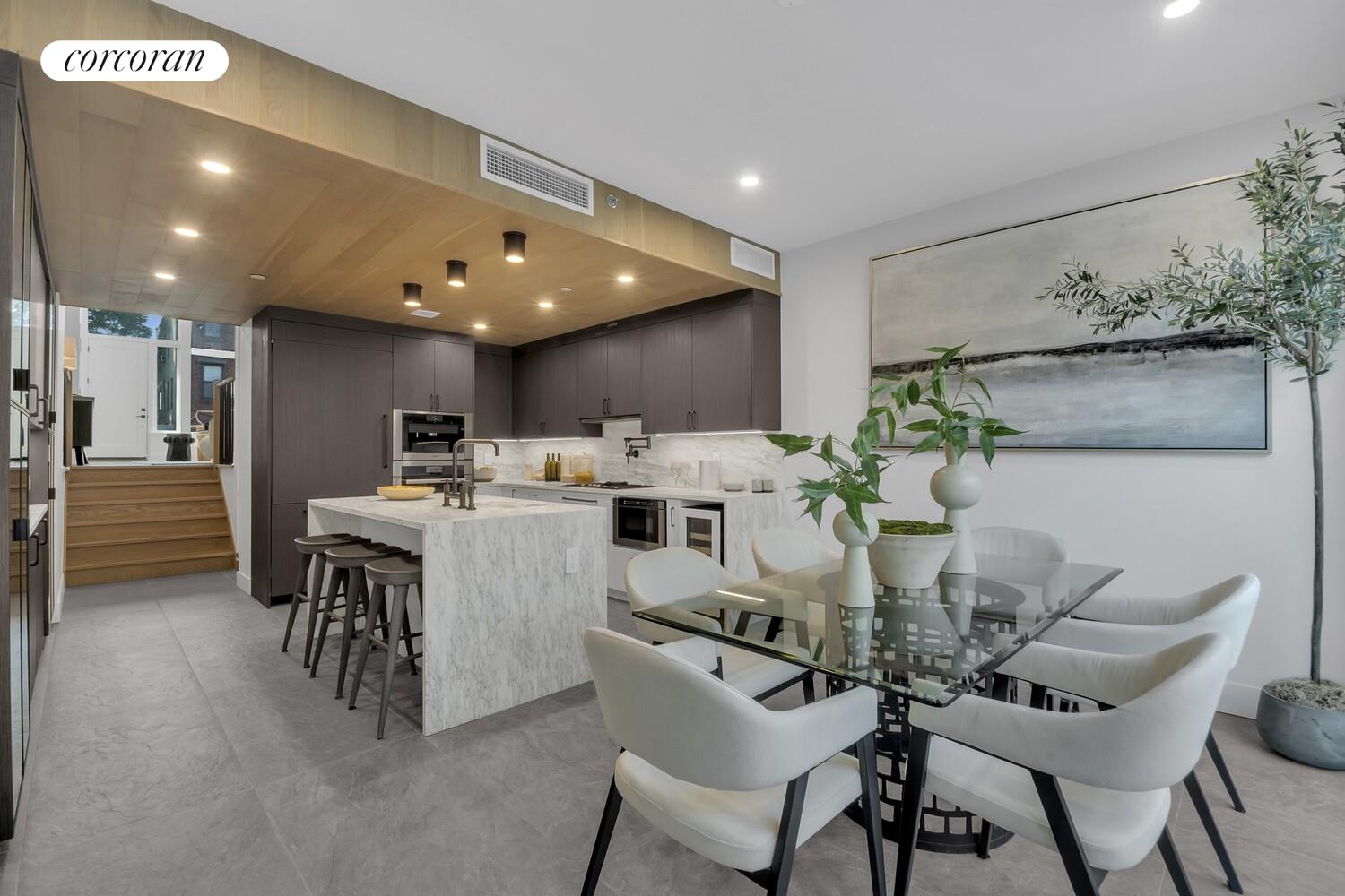 57 Summit Street Brooklyn, NY 11231 - Photo 3 of 22 a dining room with furniture and potted plants