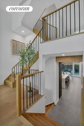 a large bedroom with a bed and window
