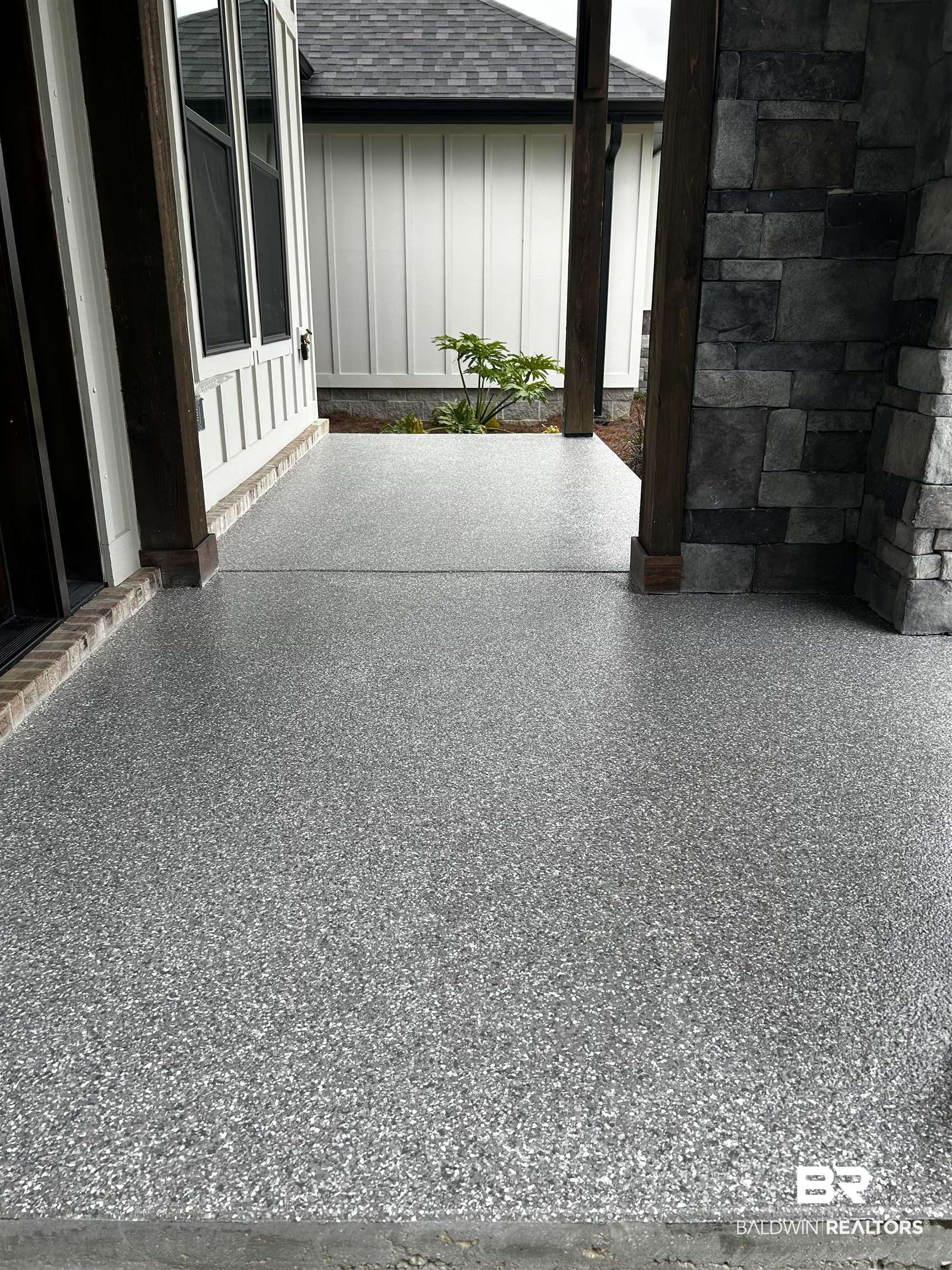 13066 Gopher Court Elberta, AL 36530 - Photo 37 of 38 Coated concrete patio featuring a textured finish.