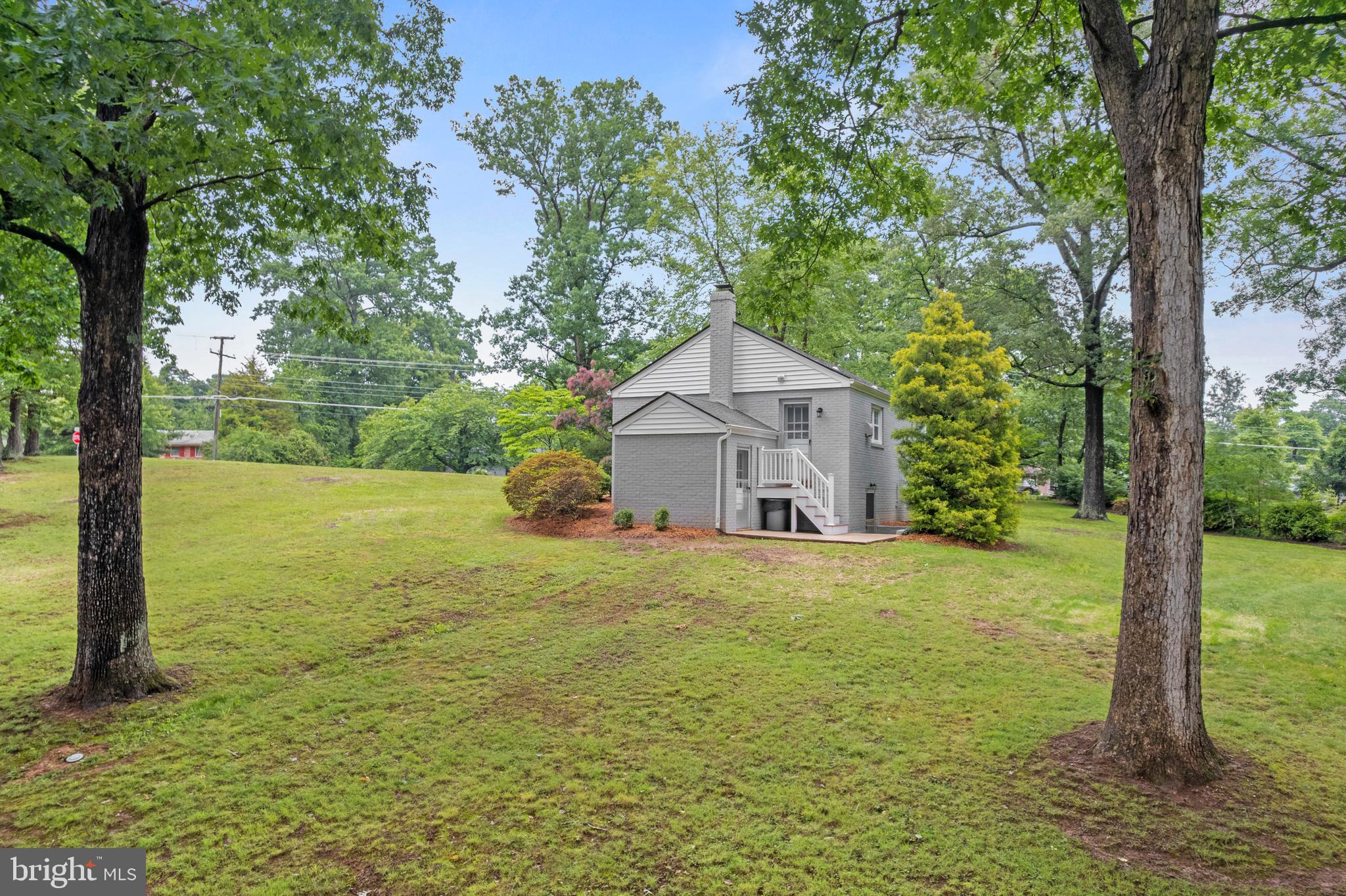 12131 Waples Mill Road Oakton, VA 22124 - Photo 31 of 40 a house view with a garden space