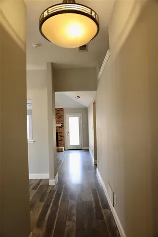 a view of a livingroom with wooden floor