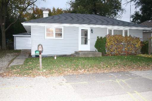 a view of outdoor space yard and front view of a house