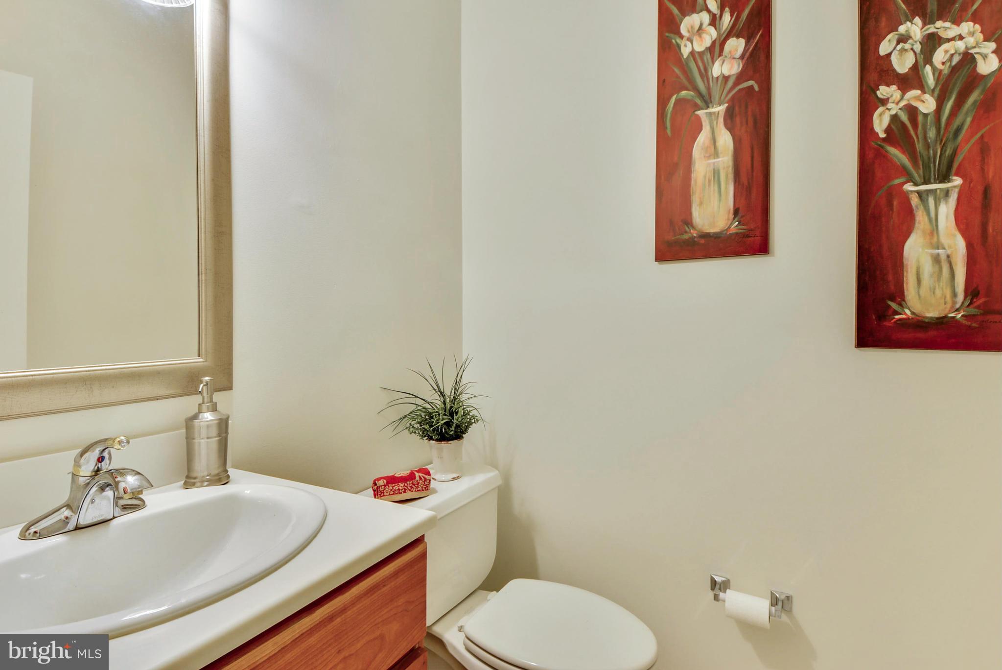 15509 Overchase Lane Bowie, MD 20715 - Photo 12 of 30 a bathroom with a sink and a toilet