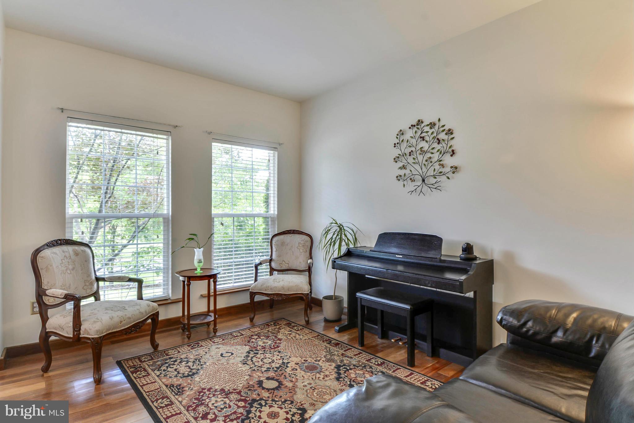 15509 Overchase Lane Bowie, MD 20715 - Photo 3 of 30 a living room with furniture and a window