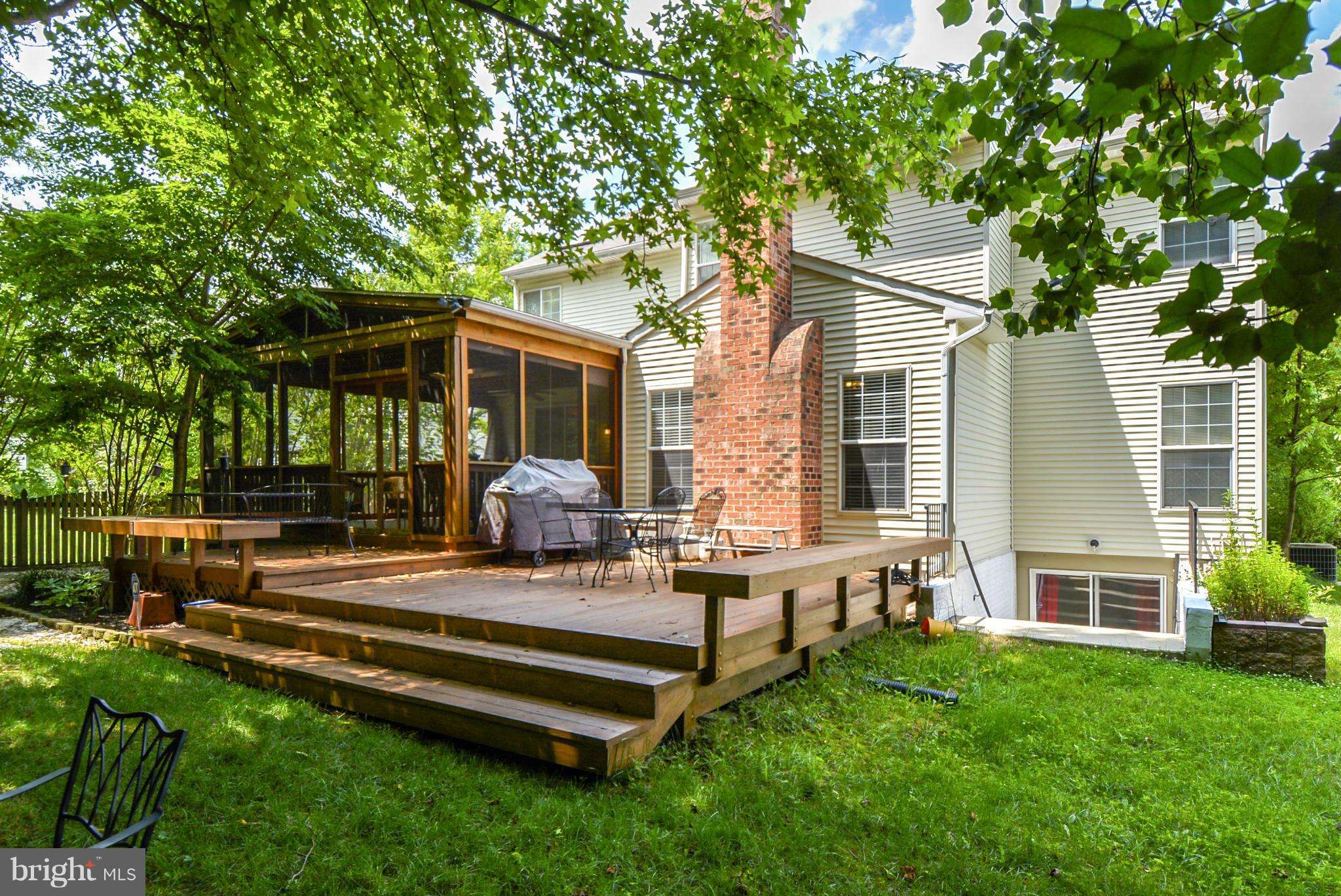 15509 Overchase Lane Bowie, MD 20715 - Photo 26 of 30 a view of a house with backyard porch and sitting area
