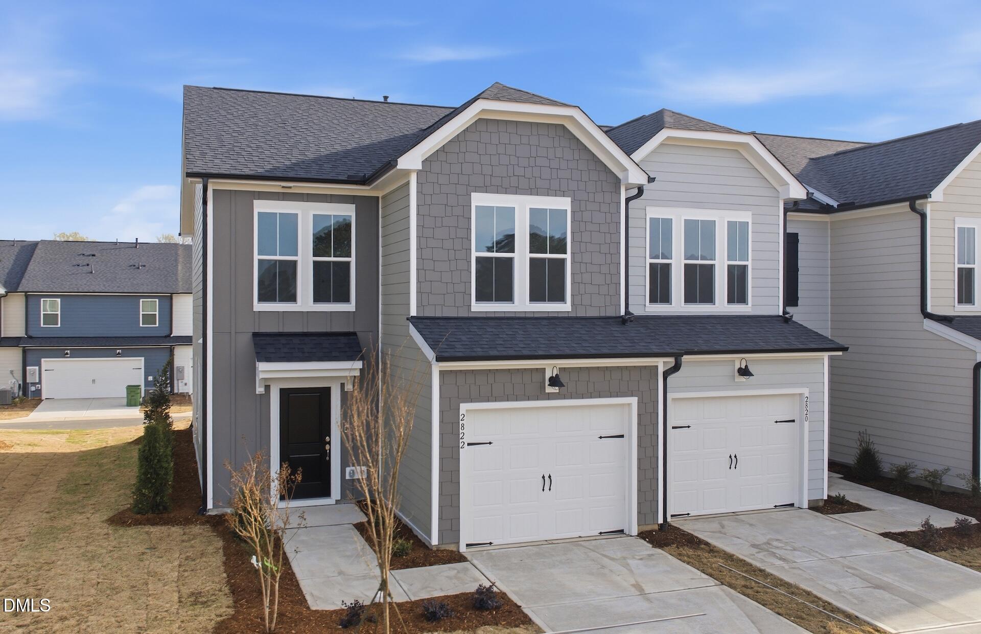2822 Rodeo Court Fuquay-Varina, NC 27526 - Photo 3 of 30 a front view of a house with a yard