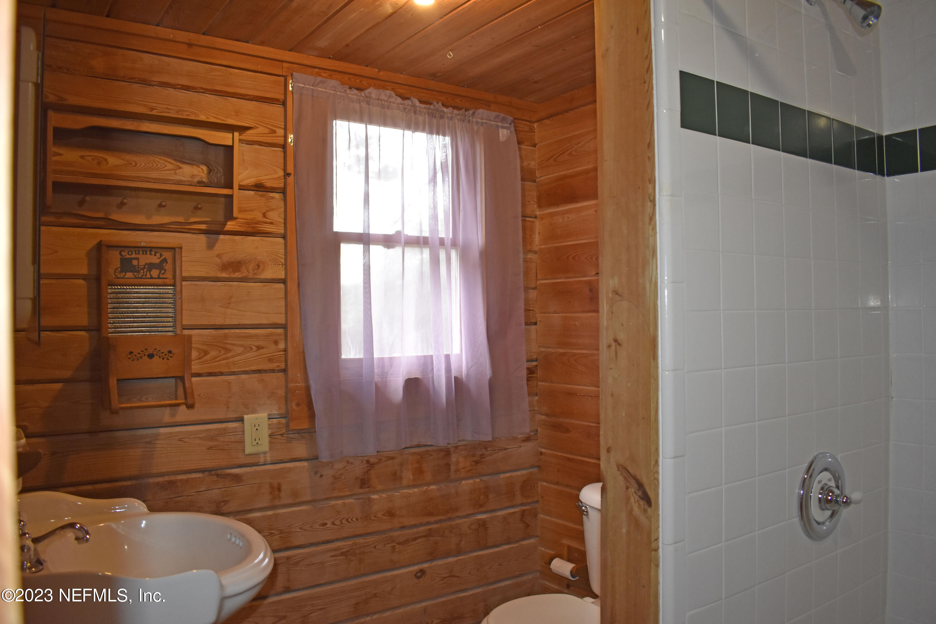 119 Whirlwind Loop Hawthorne, FL 32640 - Photo 17 of 52 downstairs bathroom