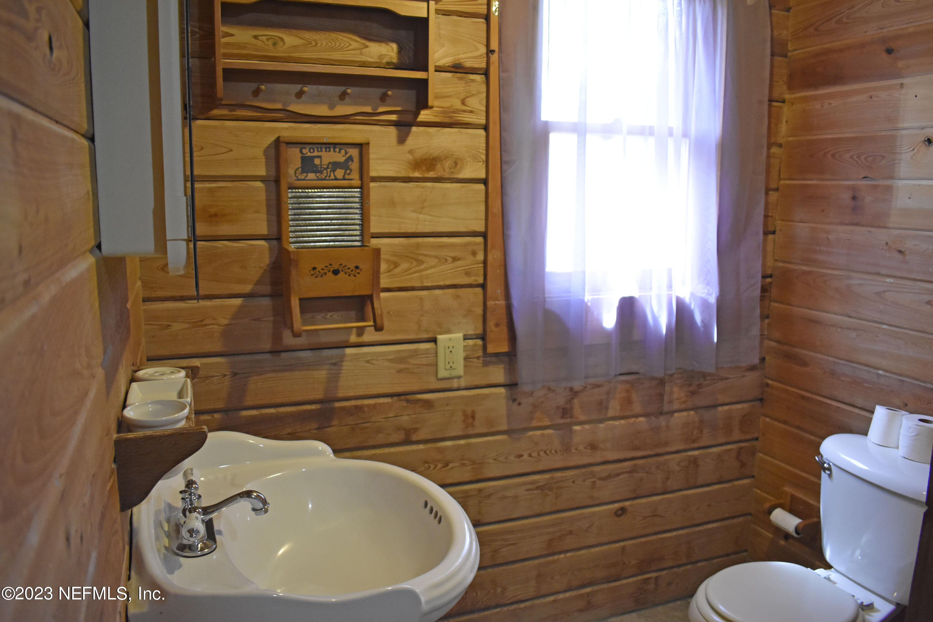 119 Whirlwind Loop Hawthorne, FL 32640 - Photo 18 of 52 downstairs bathroom