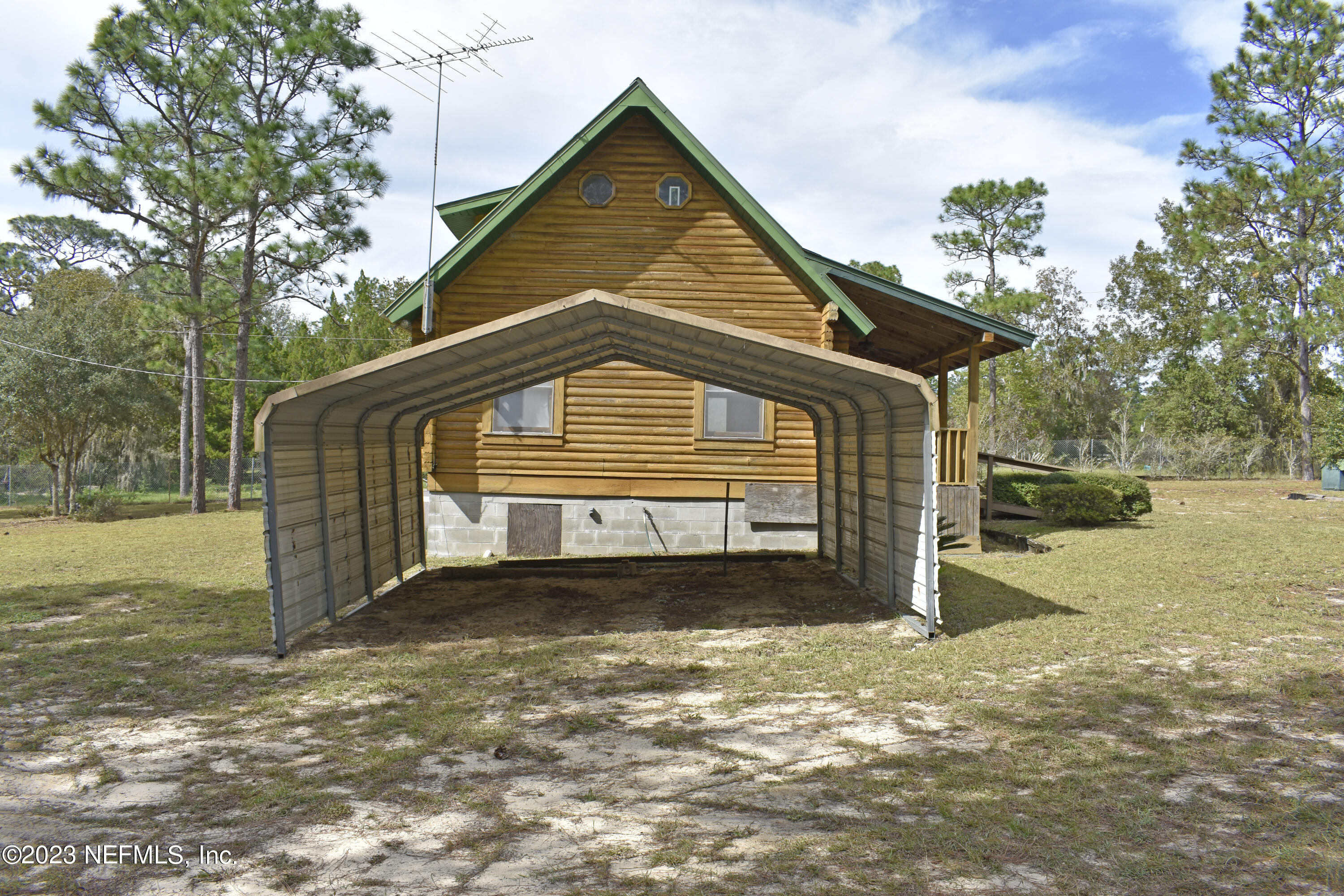 119 Whirlwind Loop Hawthorne, FL 32640 - Photo 34 of 52 2-car-carport
