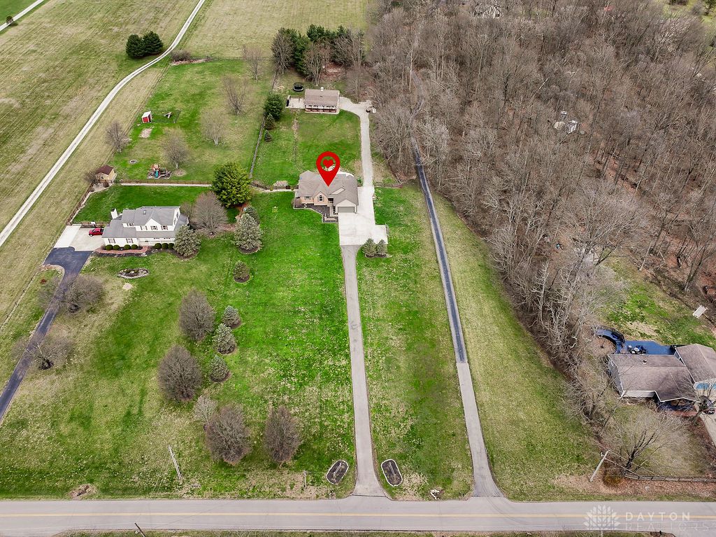7400 Cook-Jones Road Waynesville, OH 45068 - Photo 6 of 72 An aerial view showcases this expansive property, highlighting the home and surrounding landscape.