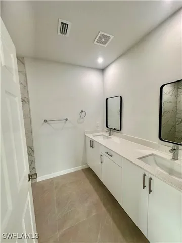 a bathroom with a shower and a toilet
