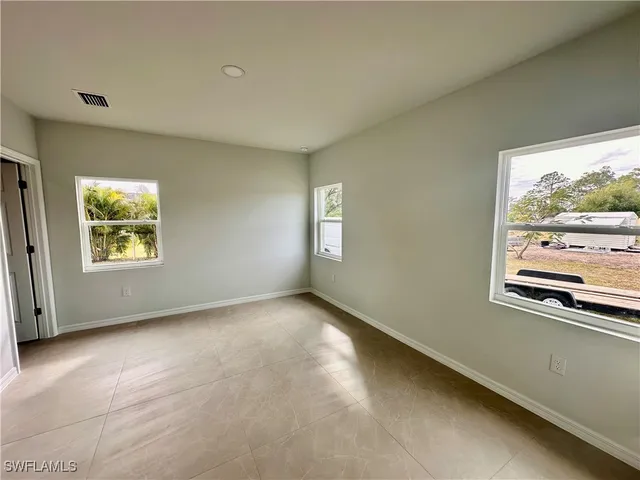 a house with trees in the background
