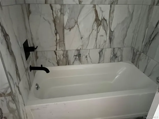 a bathroom with a bathtub
