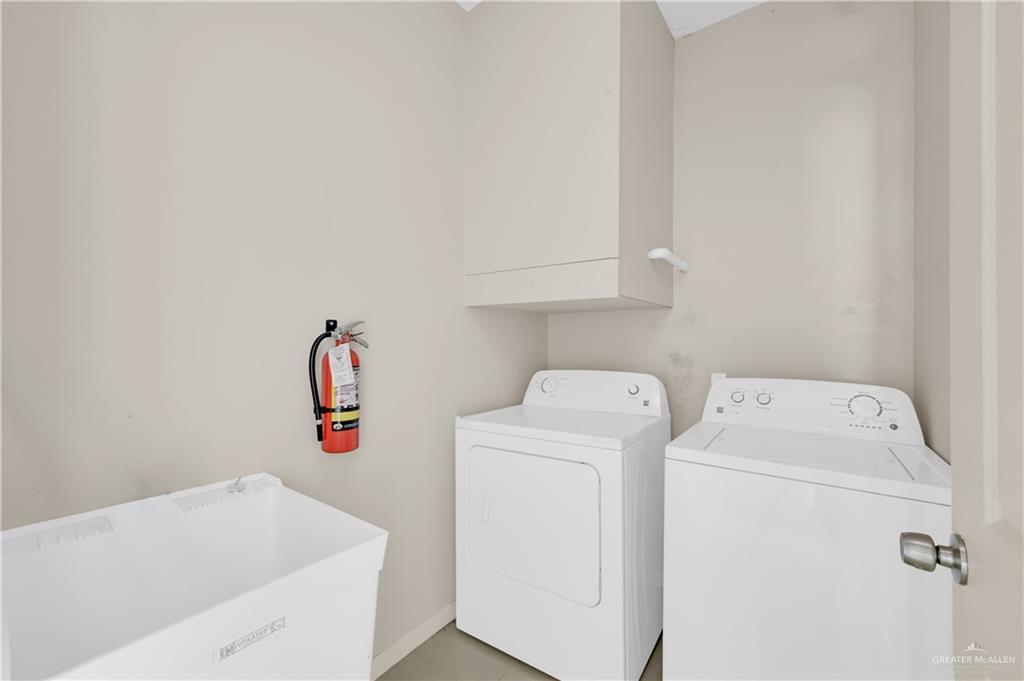 3005 South K Center Street, Unit 3 McAllen, TX 78503 - Photo 15 of 15 a utility room with dryer and washer
