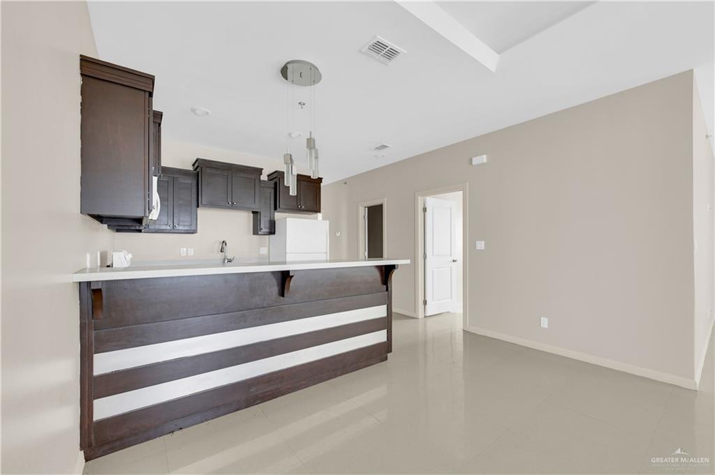 3005 South K Center Street, Unit 3 McAllen, TX 78503 - Photo 6 of 15 a bathroom with a sink and a mirror