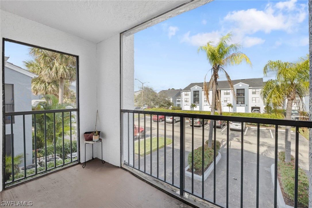 13571 Eagle Ridge Drive, Unit 1325 Fort Myers, FL 33912 - Photo 2 of 26 a view of a city from a balcony