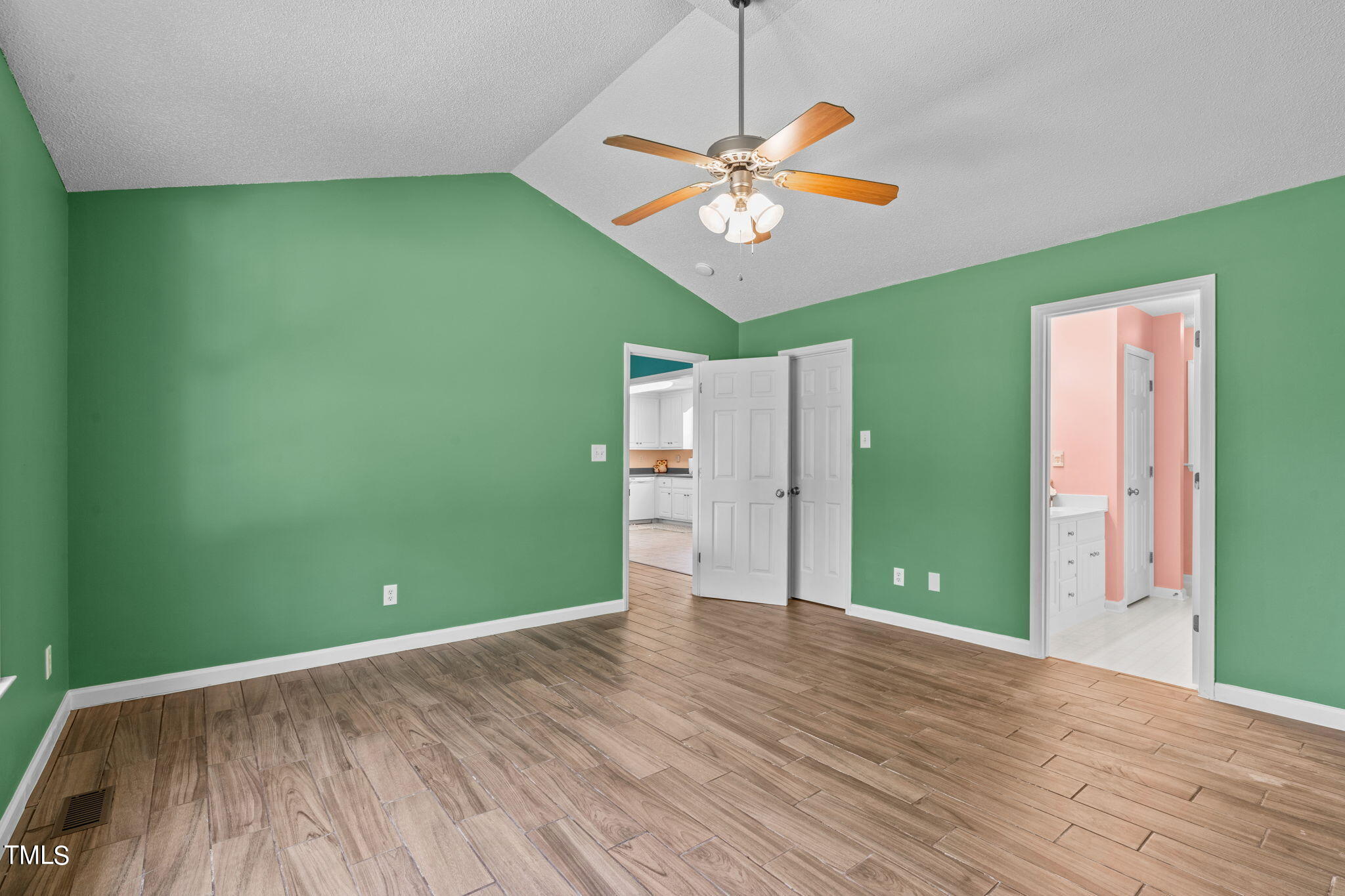 128 Edmondson Drive Willow Spring, NC 27592 - Photo 18 of 38 wooden floor in an empty room with a window