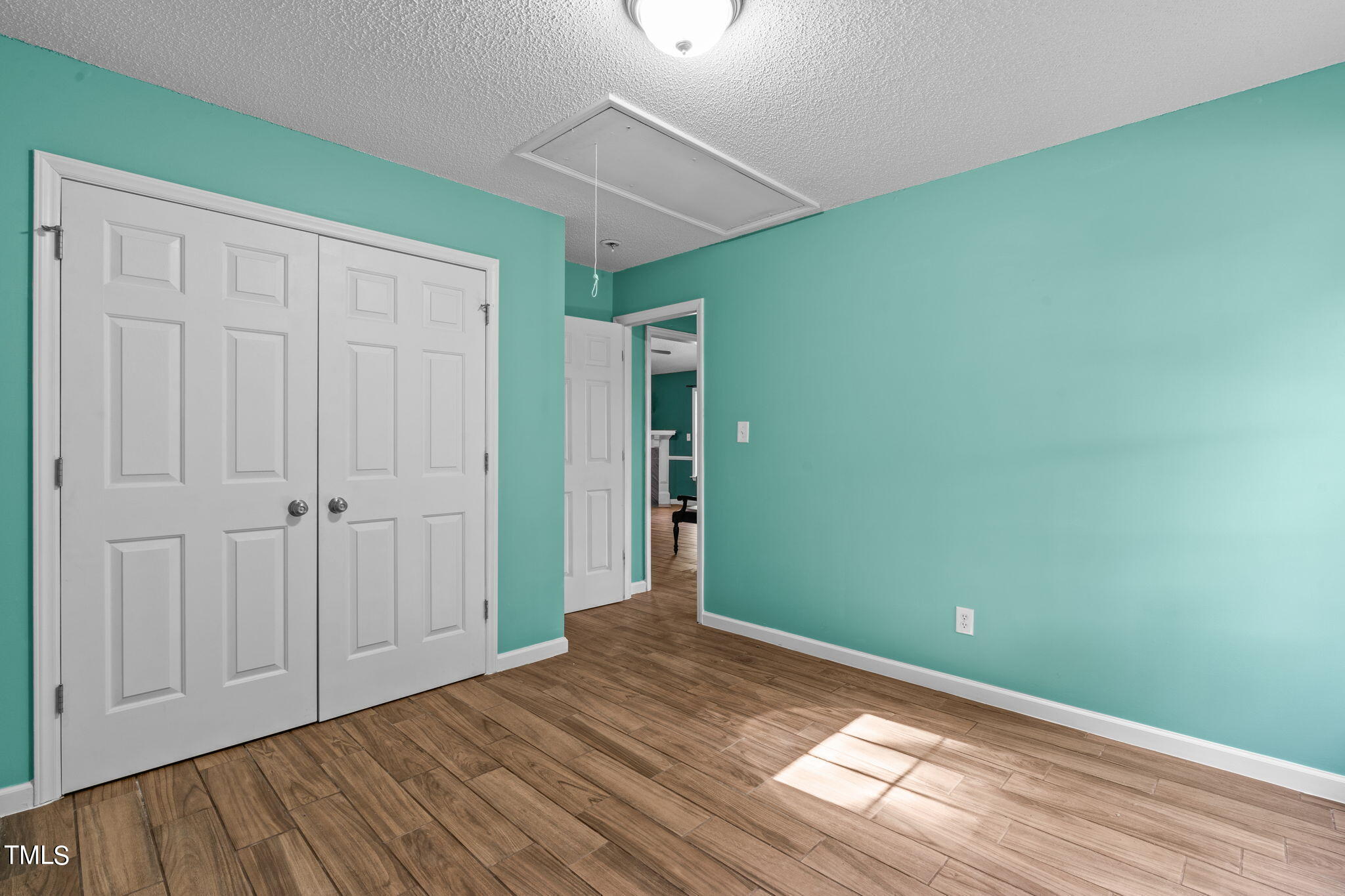 128 Edmondson Drive Willow Spring, NC 27592 - Photo 24 of 38 a view of a room with wooden floor and entryway