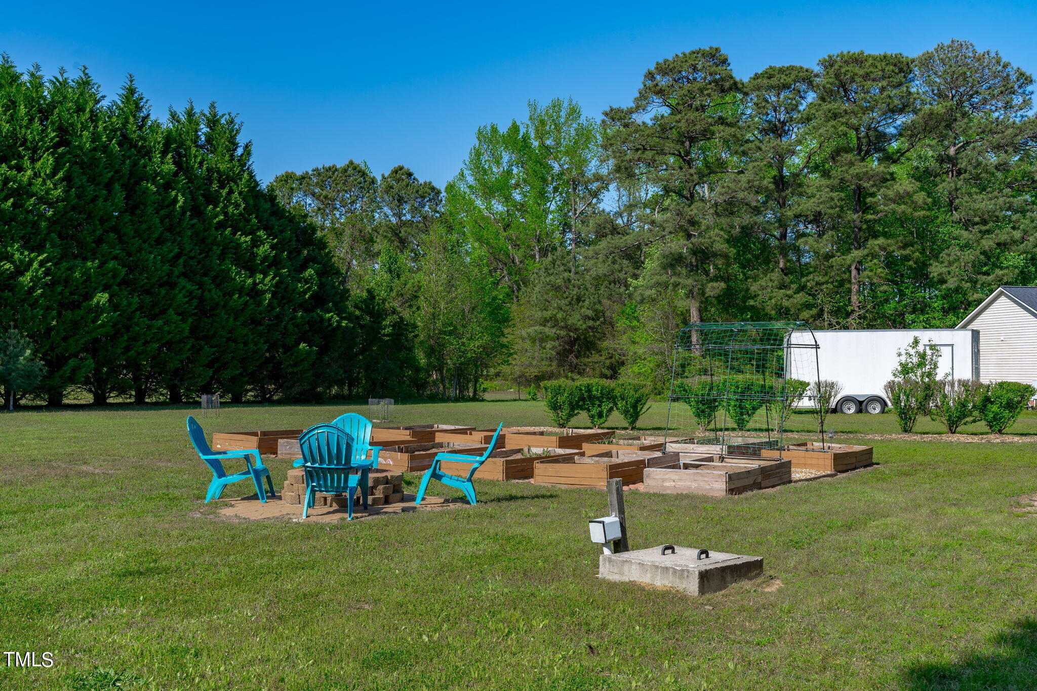 128 Edmondson Drive Willow Spring, NC 27592 - Photo 32 of 38 an aerial view of a house with outdoor space patio and lake view