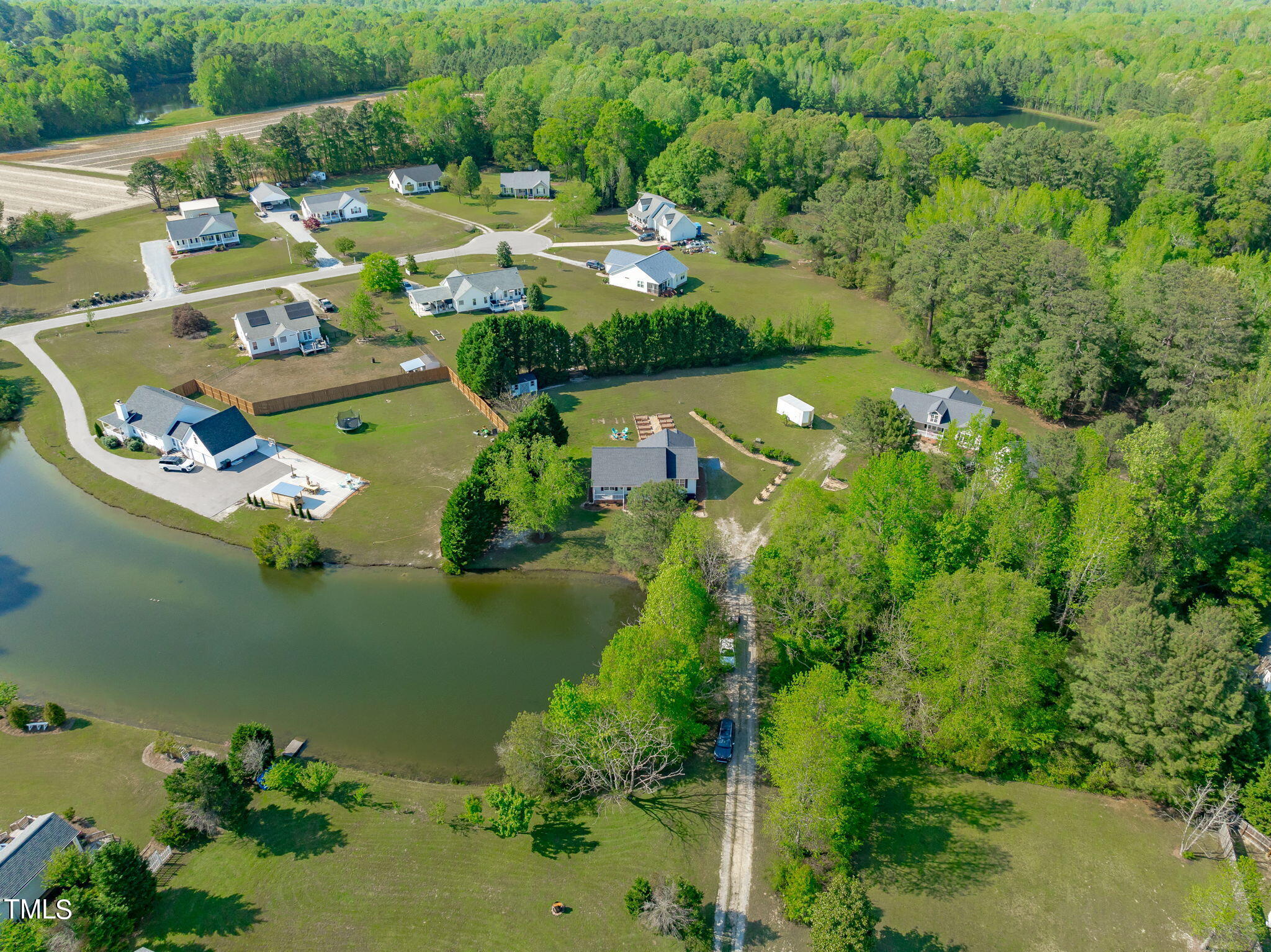 128 Edmondson Drive Willow Spring, NC 27592 - Photo 37 of 38 an aerial view of a house with a garden