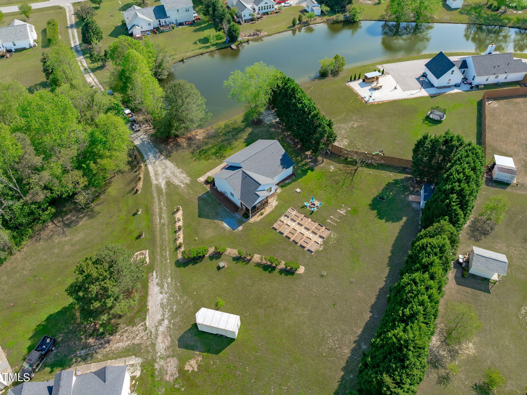 128 Edmondson Drive Willow Spring, NC 27592 - Photo 38 of 38 an aerial view of residential houses with outdoor space