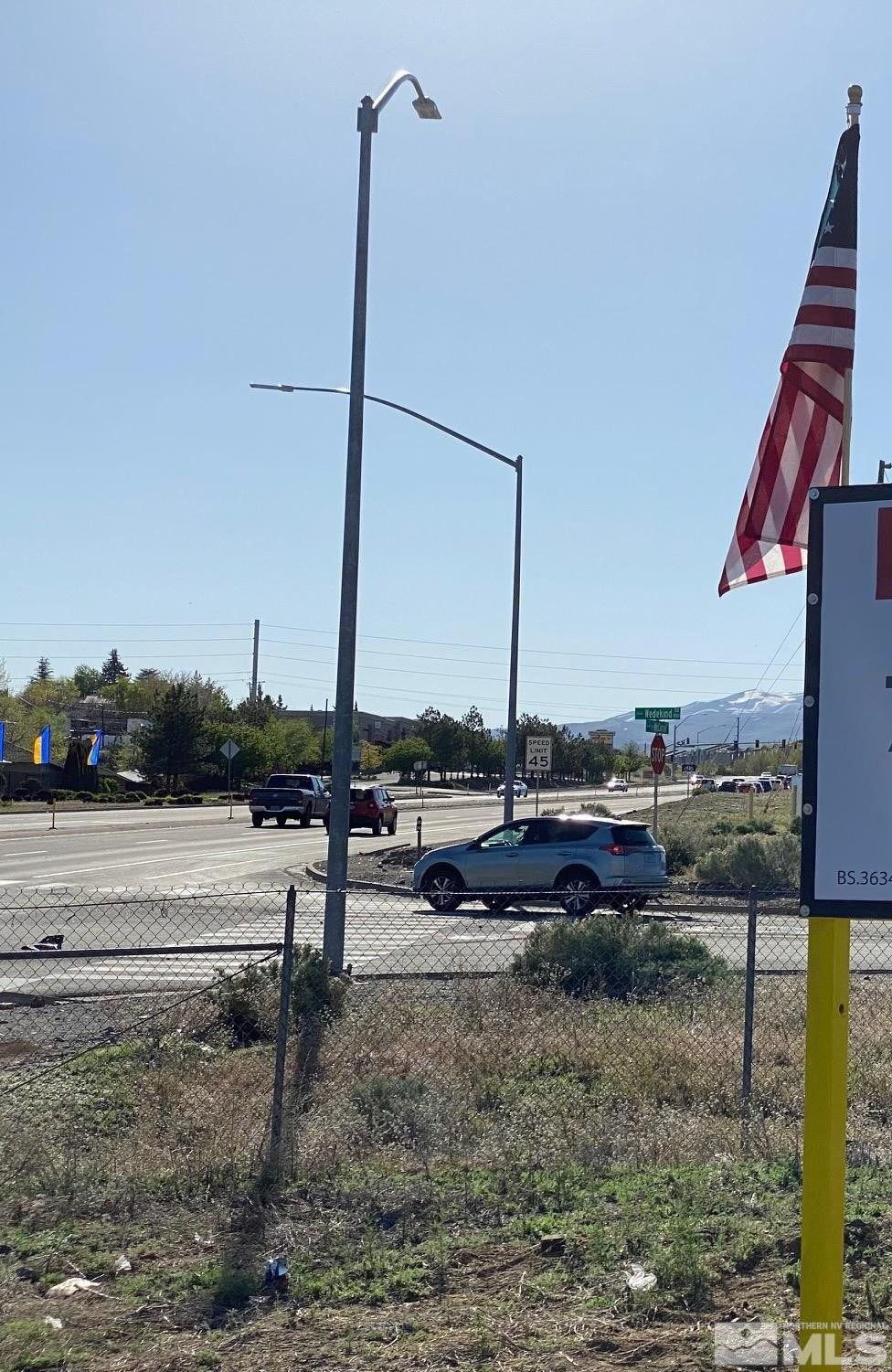 4620 Wedekind Road, Unit N MCCARRAN BLVD & WEDEKIND RD Sparks, NV 89431 - Photo 12 of 13 a view of a lake with a beach