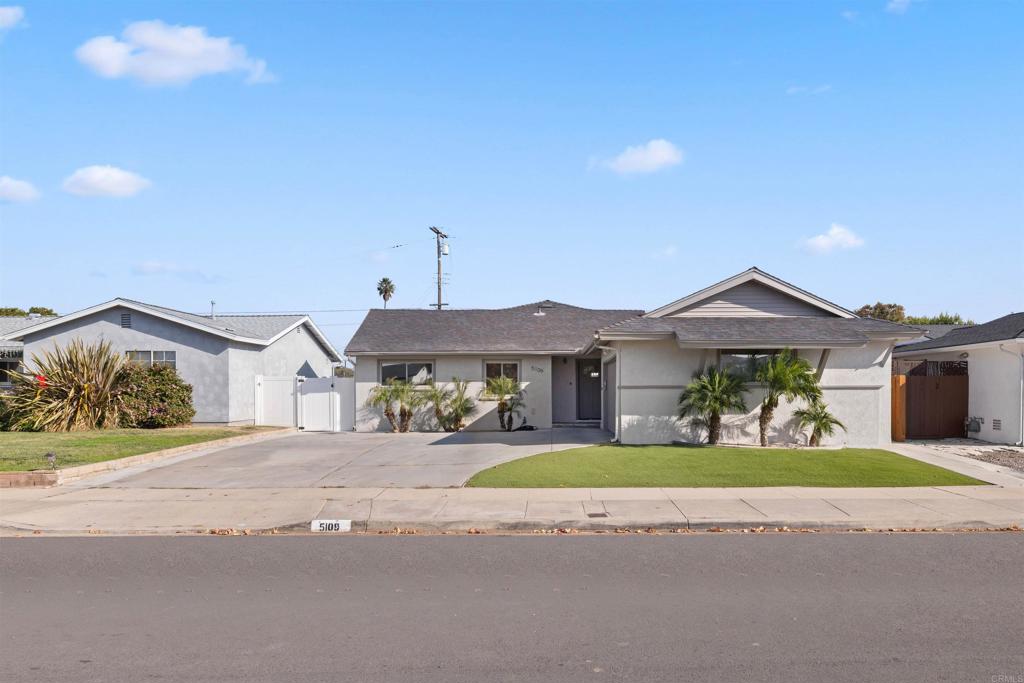 5109 Constitution Road San Diego, CA 92117 - Photo 1 of 1 a front view of house with yard and green space