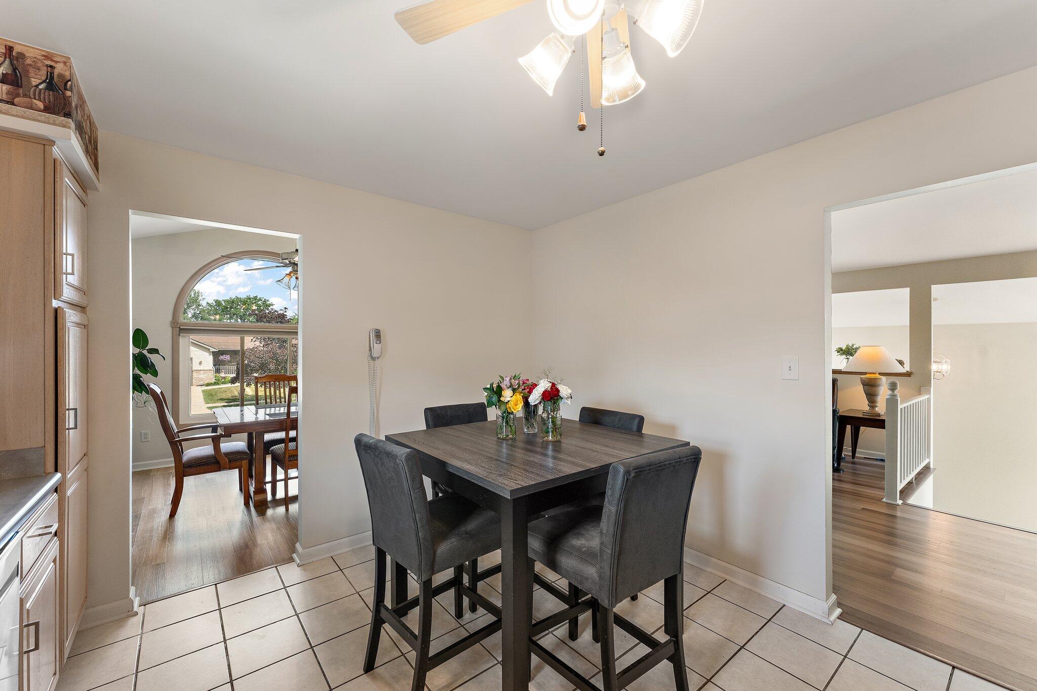 658 Forest Avenue Griffith, IN 46319 - Photo 14 of 31 a dining room with furniture and window