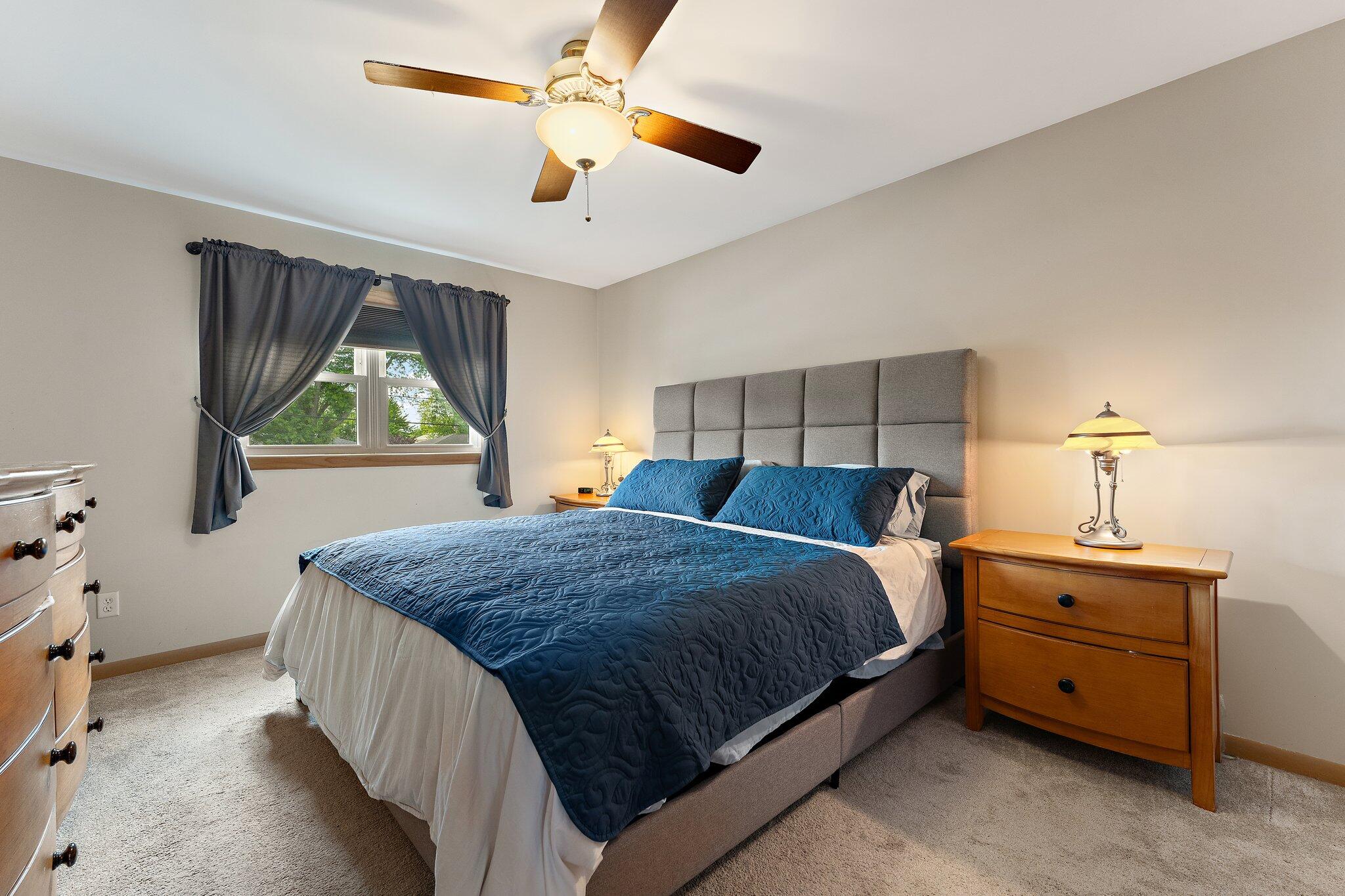 658 Forest Avenue Griffith, IN 46319 - Photo 17 of 31 a bedroom with bed and window