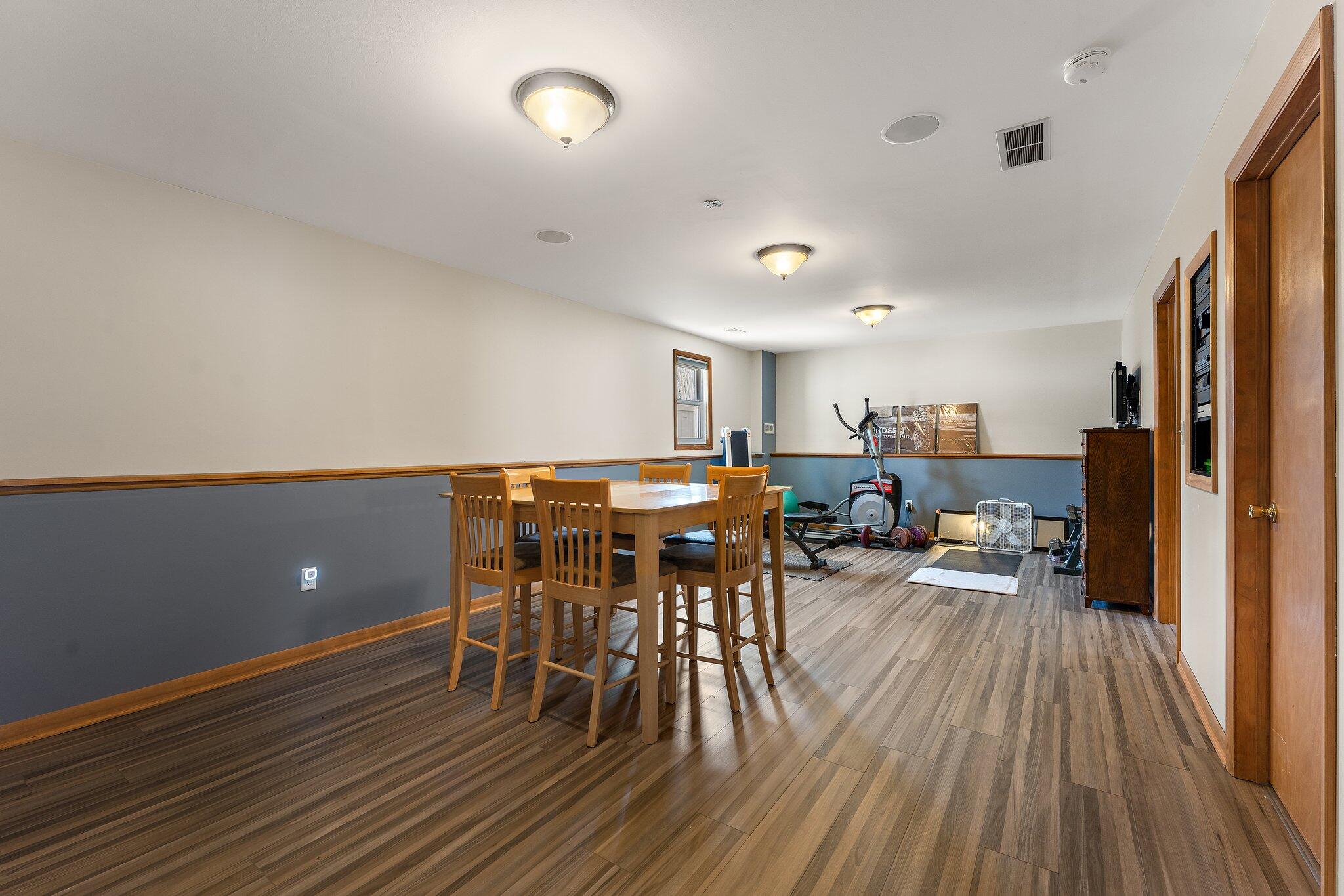 658 Forest Avenue Griffith, IN 46319 - Photo 22 of 31 a view of a dining room with furniture and wooden floor
